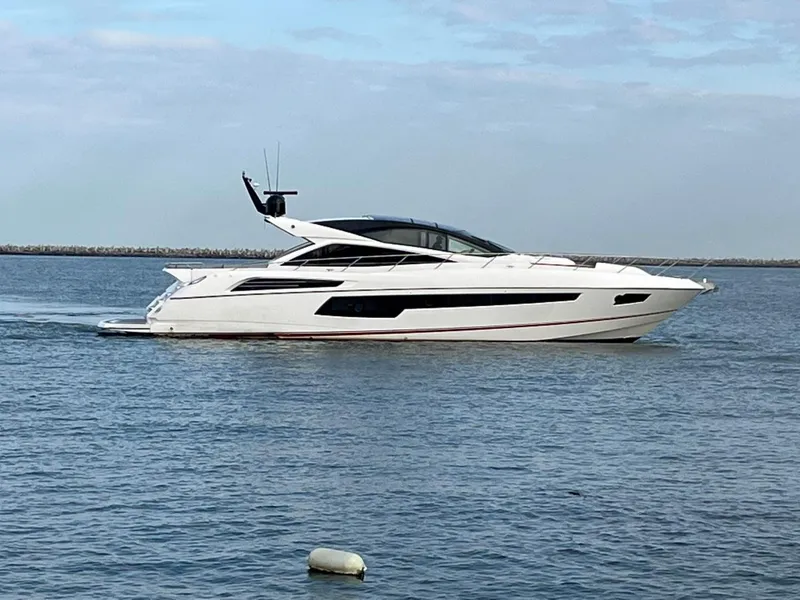 Slide: The Image of 2014 Sunseeker 68 Predator yacht cruising on calm waters. - 31