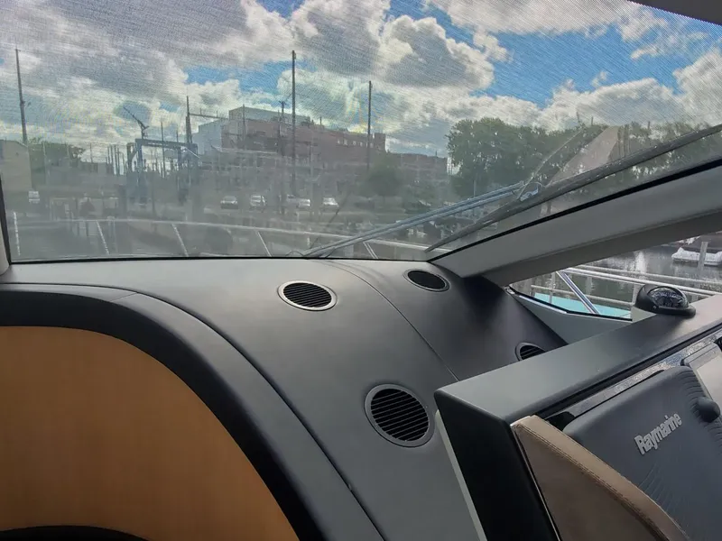 Slide: The Image of Interior view of 2014 Sunseeker 68 Predator yacht dashboard with Raymarine equipment. - 8