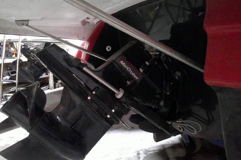 Slide: The Image of 2023 Monterey 224FS boat with MerCruiser engine in a storage facility. - 16