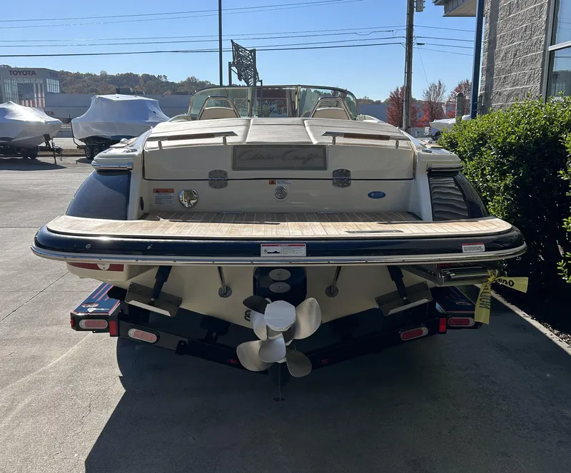 Slide: The Image of 2020 Chris-Craft Launch 27 boat on trailer, rear view. - 4