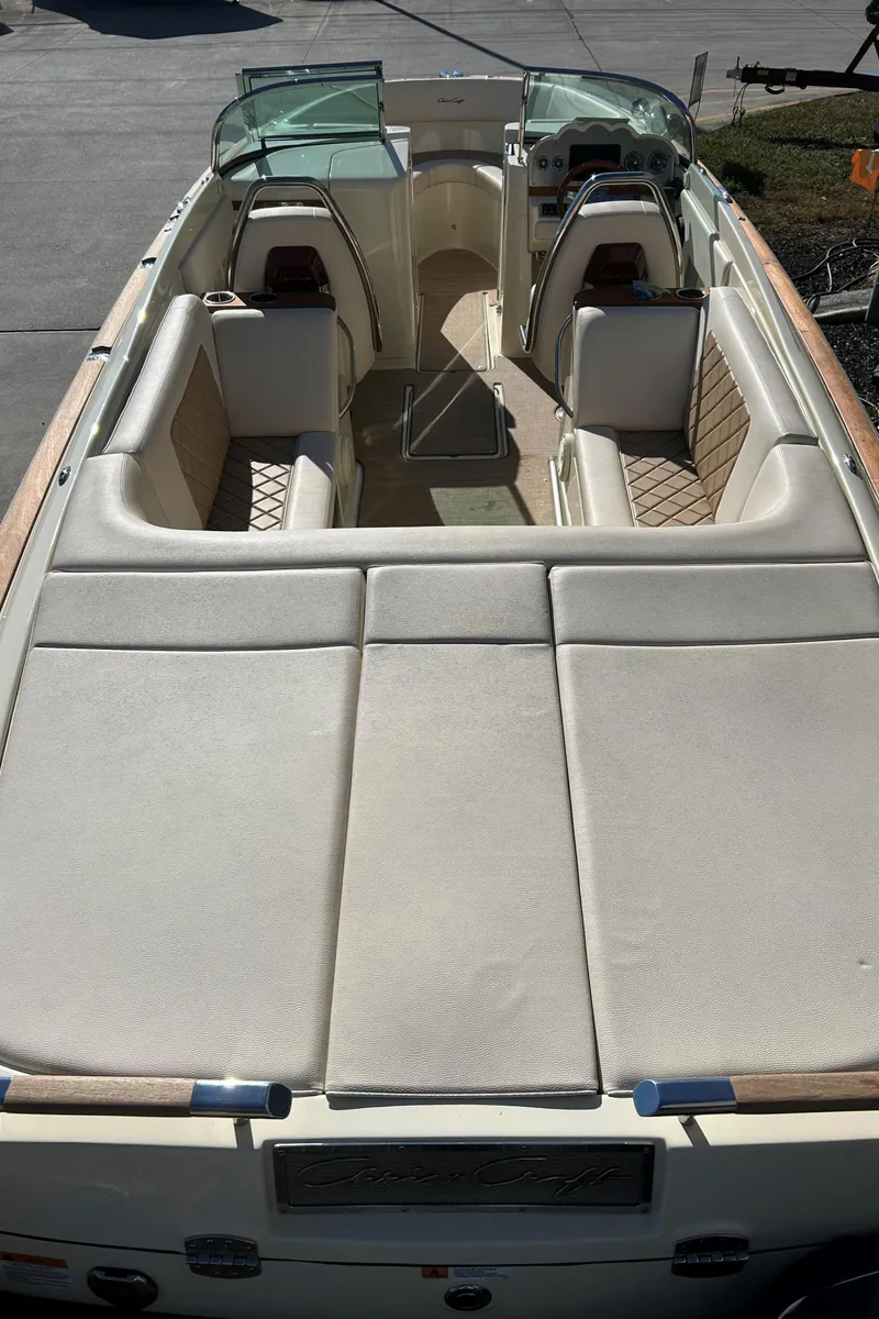 Slide: The Image of 2020 Chris-Craft Launch 27 boat with spacious seating and elegant design. - 6