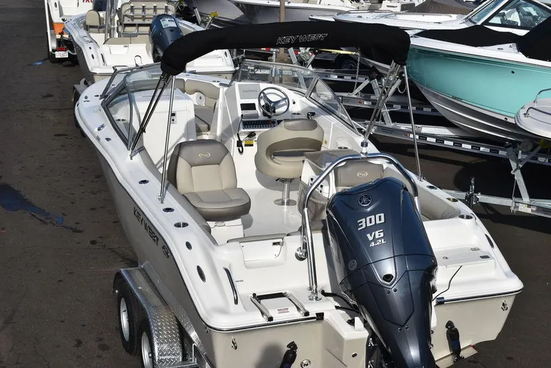 Slide: The Image of 2024 Key West 239 DFS boat with Yamaha 300 V6 engine on trailer. - 11