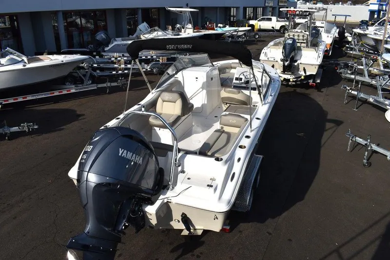 Slide: The Image of 2024 Key West 239 DFS boat with Yamaha engine in a dealership lot. - 13