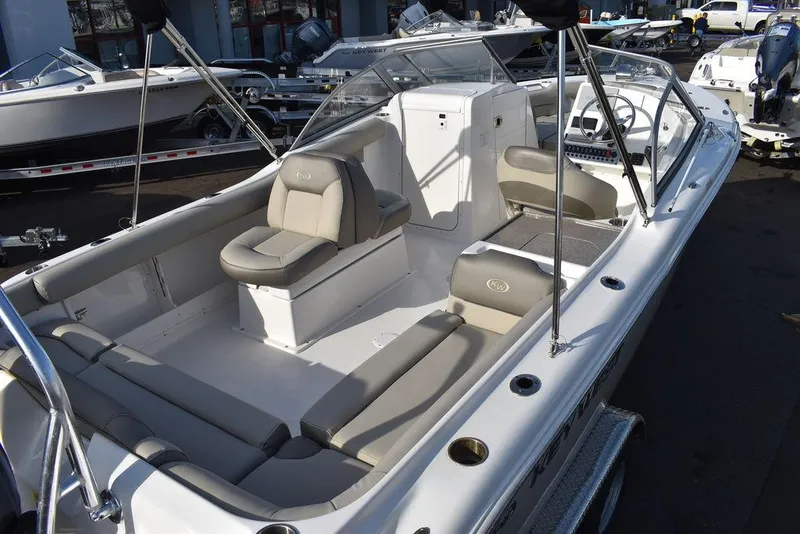 Slide: The Image of 2024 Key West 239 DFS boat interior with seating and console. - 15