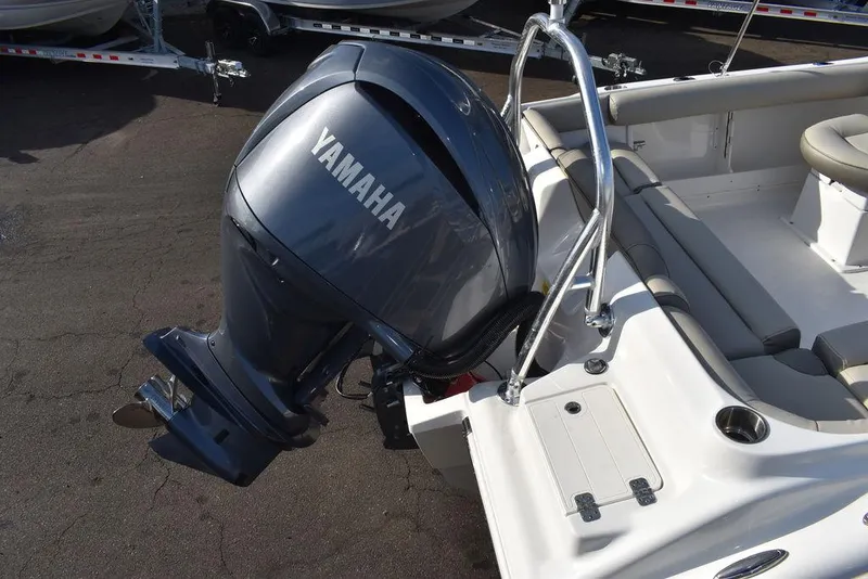 Slide: The Image of 2024 Key West 239 DFS boat with Yamaha outboard motor, rear seating view. - 16