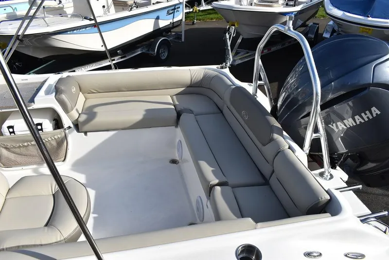 Slide: The Image of 2024 Key West 239 DFS boat with Yamaha engine, featuring spacious seating area. - 18
