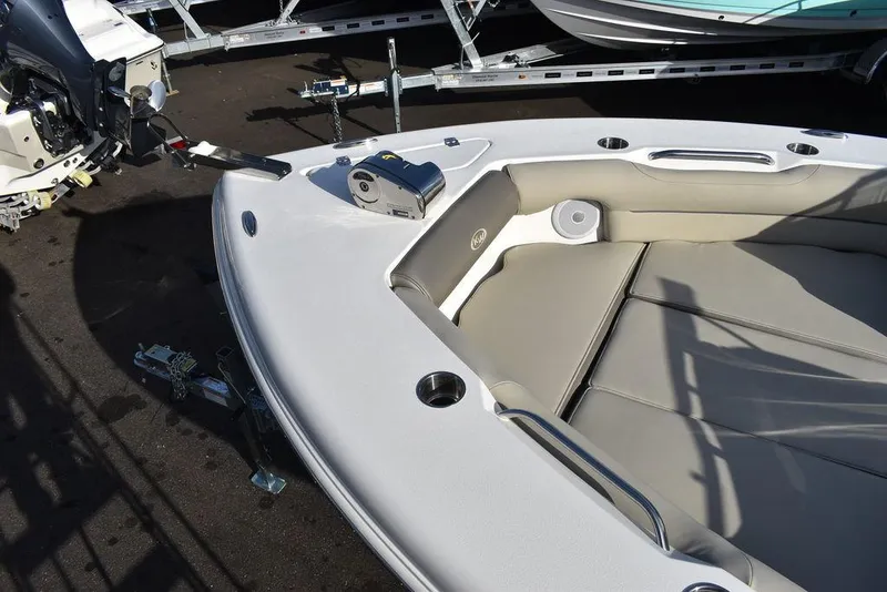 Slide: The Image of 2024 Key West 239 DFS boat interior with seating and cup holders. - 22