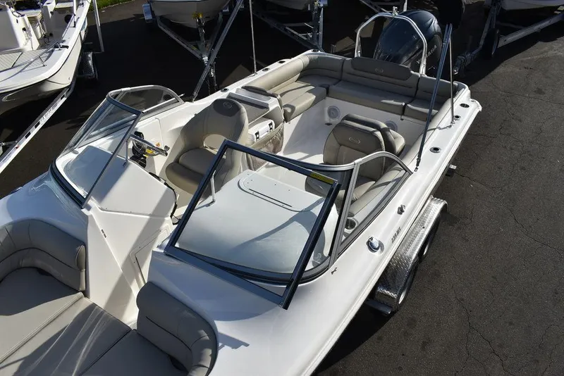 Slide: The Image of 2024 Key West 239 DFS boat interior with seating and console. - 23