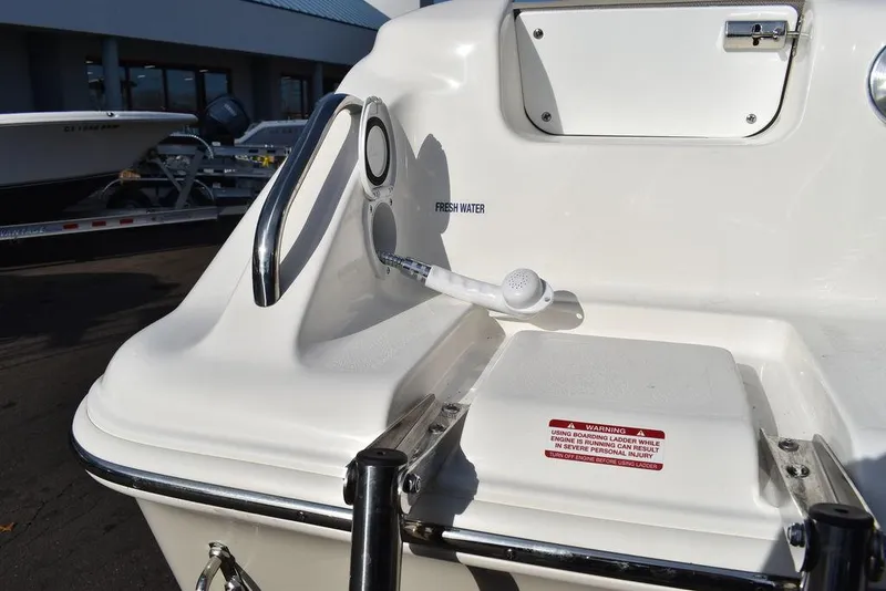 Slide: The Image of 2024 Key West 239 DFS boat with freshwater shower feature. - 27