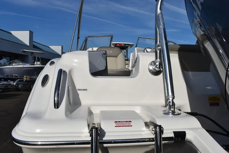 Slide: The Image of 2024 Key West 239 DFS boat with swim platform and ladder. - 28