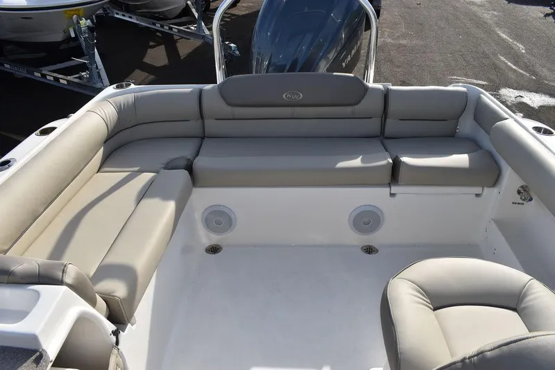 Slide: The Image of 2024 Key West 239 DFS boat interior with cushioned seating and sleek design. - 29