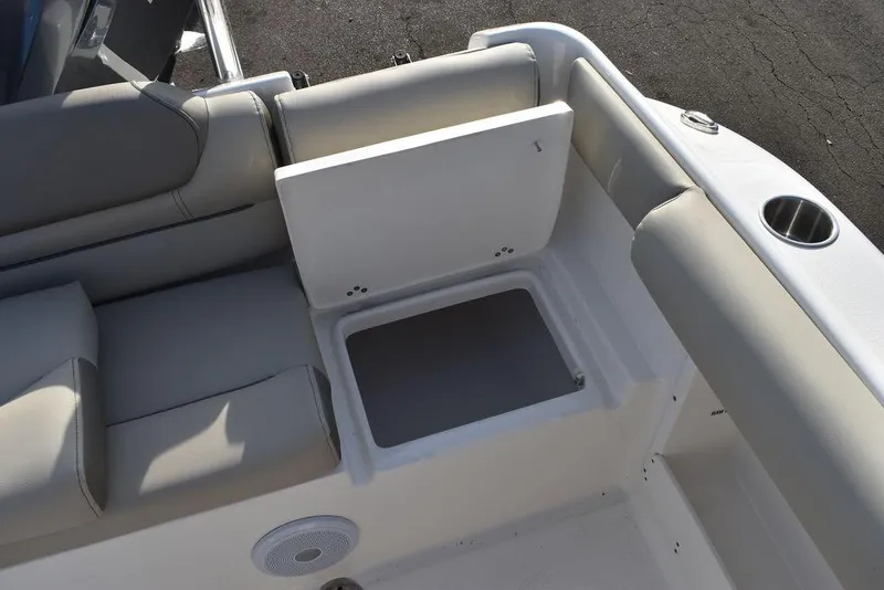 Slide: The Image of 2024 Key West 239 DFS boat seating area with storage compartment. - 32