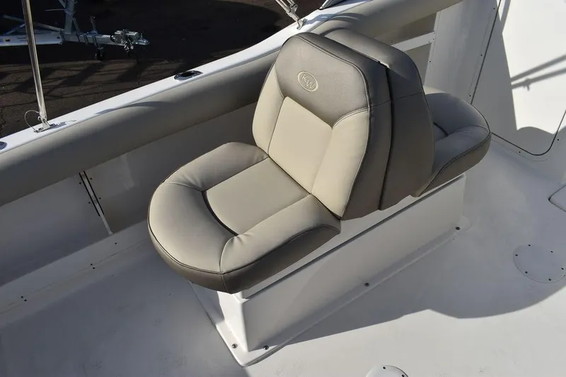 Slide: The Image of 2024 Key West 239 DFS boat seat, beige upholstery, sleek design. - 35