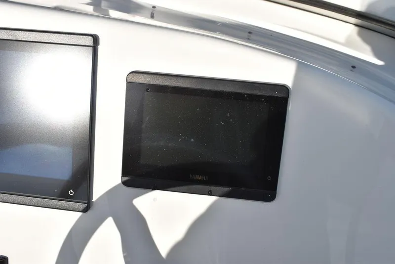 Slide: The Image of 2024 Key West 239 DFS dashboard with dual display screens. - 46