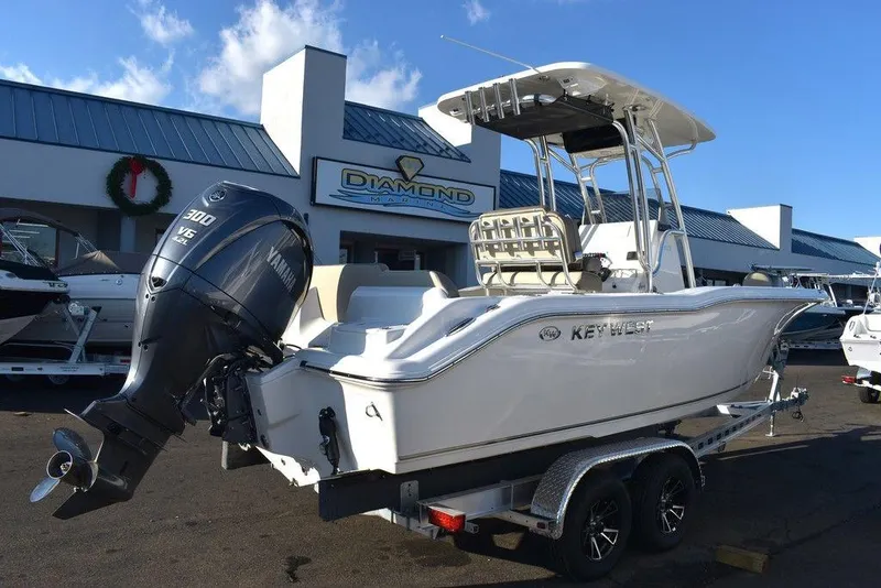 Slide: The Image of 2024 Key West 239 FS boat with Yamaha engine on trailer at dealership. - 10