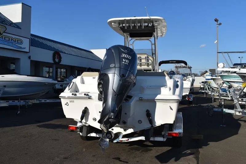 Slide: The Image of 2024 Key West 239 FS boat with Yamaha 300 V6 engine at dealership. - 15