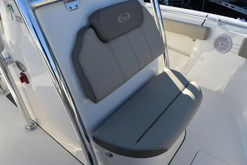 Slide: The Image of 2024 Key West 239 FS boat seat with gray upholstery and sleek design. - 20