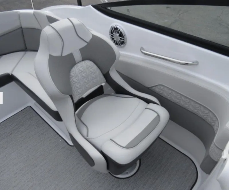 Slide: The Image of 2023 Hurricane SunDeck 2400 OB boat interior with cushioned seating and modern design. - 16