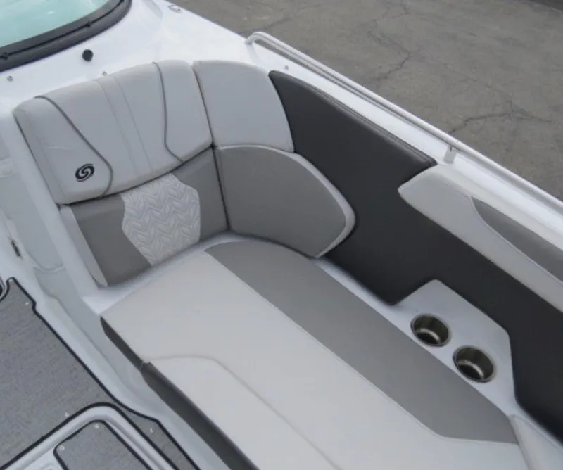 Slide: The Image of 2023 Hurricane SunDeck 2400 OB boat seating area with cup holders. - 17