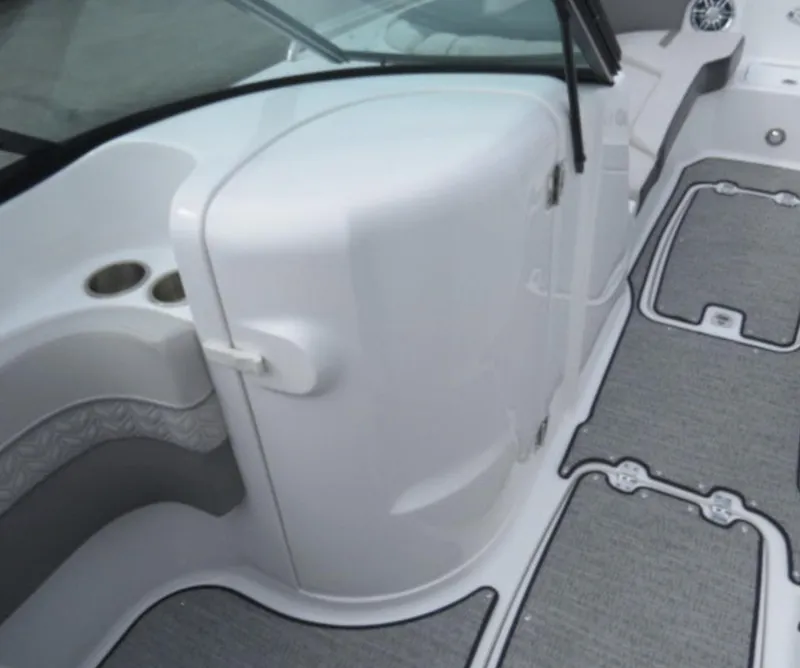 Slide: The Image of 2023 Hurricane SunDeck 2400 OB boat interior with seating and storage compartments. - 19