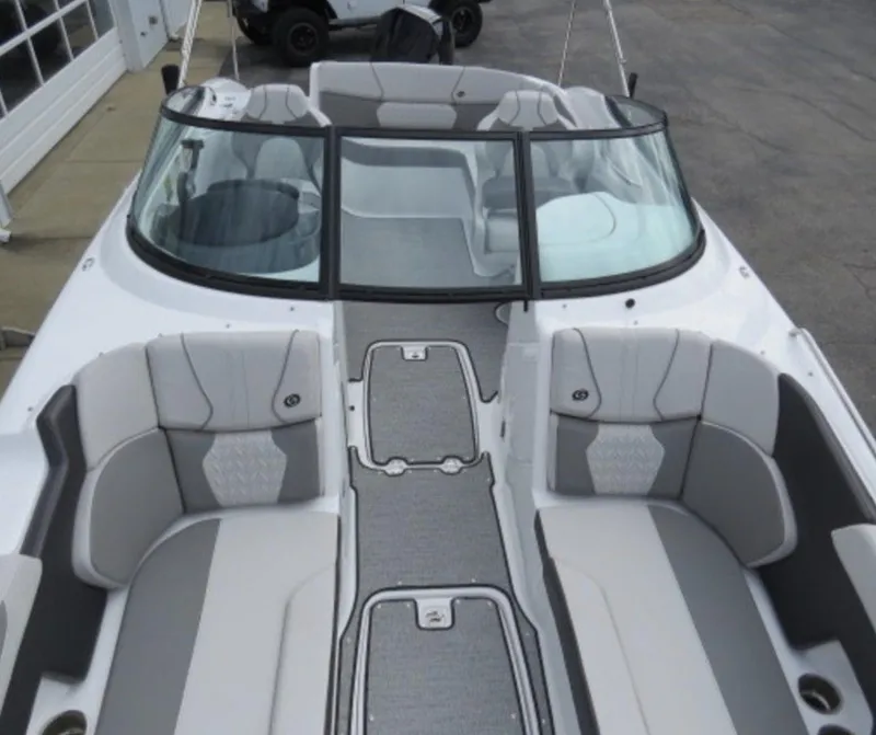 Slide: The Image of 2023 Hurricane SunDeck 2400 OB boat interior with spacious seating and modern design. - 28
