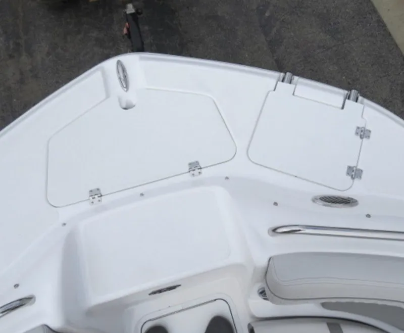 Slide: The Image of 2023 Hurricane SunDeck 2400 OB boat deck with storage compartments. - 29