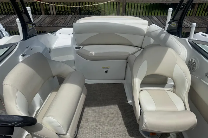 Slide: The Image of Interior of 2018 Hurricane SD 2400 I/O boat with beige seating and carpet. - 8