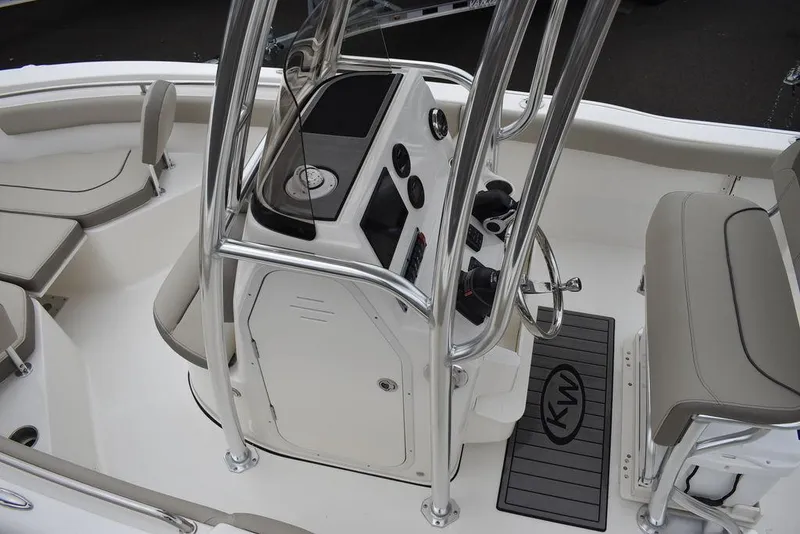 Slide: The Image of 2024 Key West 203 FS boat interior with console and seating. - 19