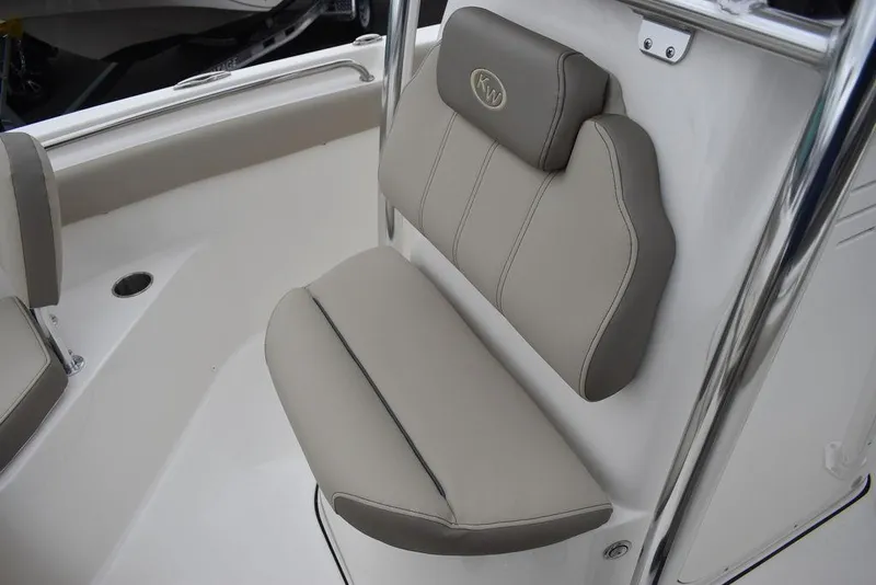 Slide: The Image of 2024 Key West 203 FS boat seat with beige and gray upholstery. - 36
