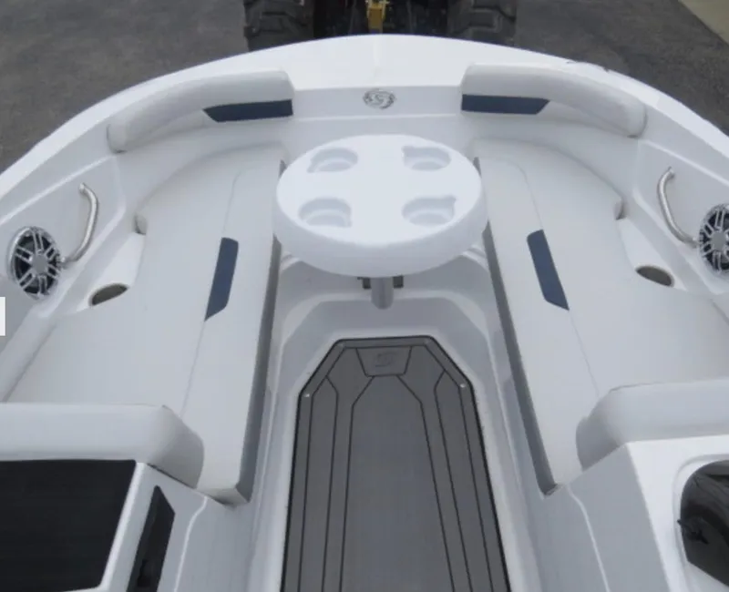 Slide: The Image of 2023 Hurricane SunDeck 185 OB boat interior with seating and table. - 12