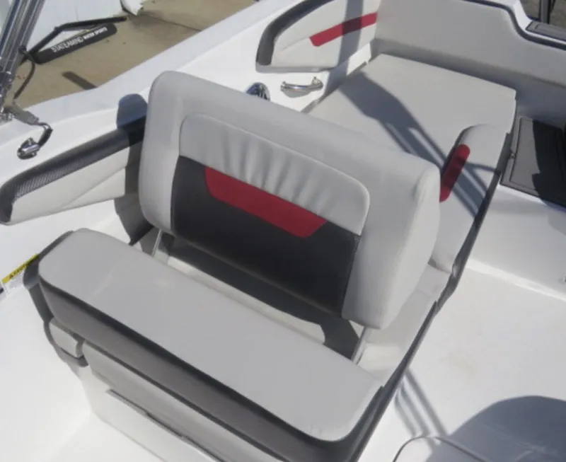 Slide: The Image of 2023 Hurricane SunDeck Sport 205 OB boat seating with gray and red upholstery. - 12