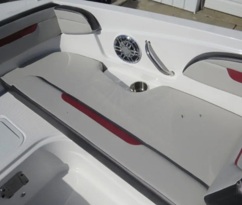 Slide: The Image of 2023 Hurricane SunDeck Sport 205 OB boat interior with seating and speaker. - 15