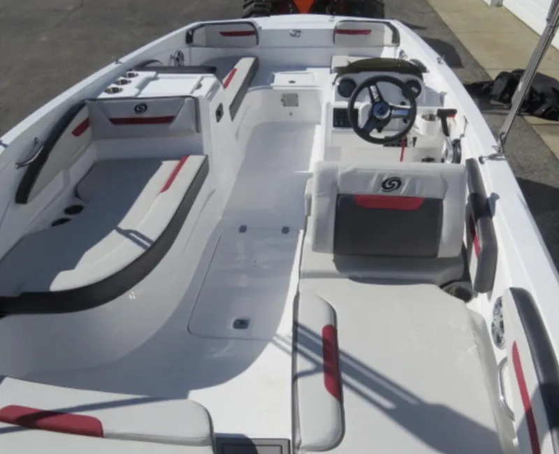 Slide: The Image of 2023 Hurricane SunDeck Sport 205 OB boat interior with seating and steering console. - 4