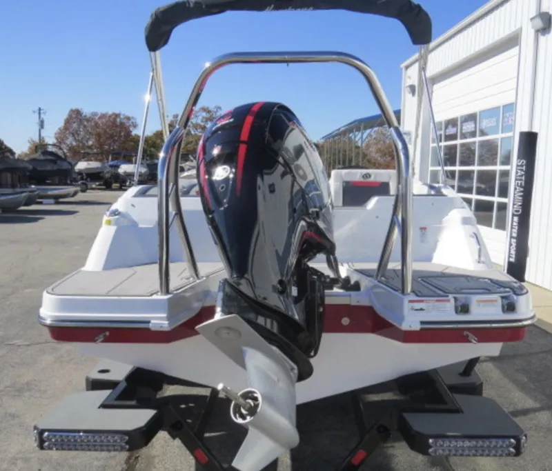 Slide: The Image of 2023 Hurricane SunDeck Sport 205 OB boat rear view with outboard motor. - 6