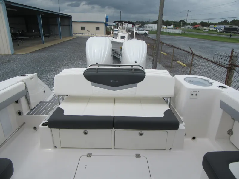 Slide: The Image of 2024 Robalo R317 Dual Console boat with dual engines and spacious seating. - 22