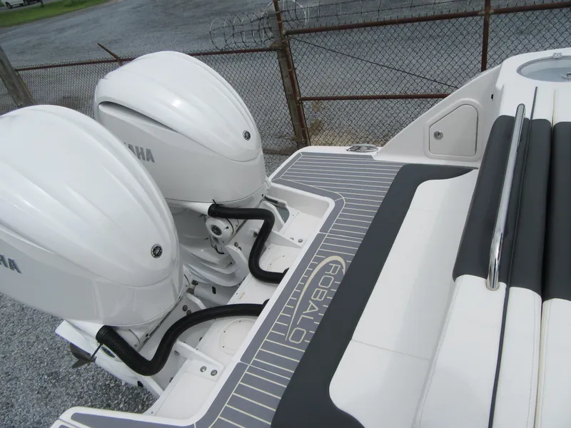 Slide: The Image of 2024 Robalo R317 Dual Console with twin Yamaha outboard engines. - 24