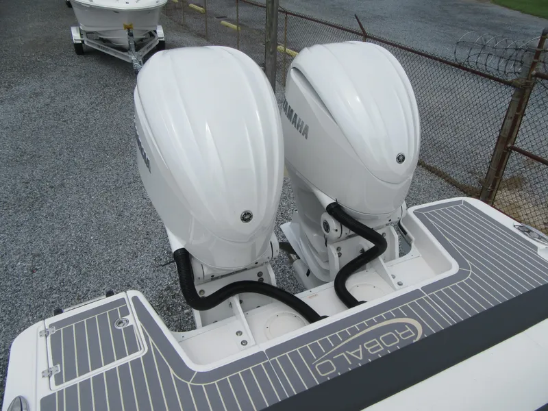 Slide: The Image of 2024 Robalo R317 Dual Console with twin Yamaha outboard engines. - 27