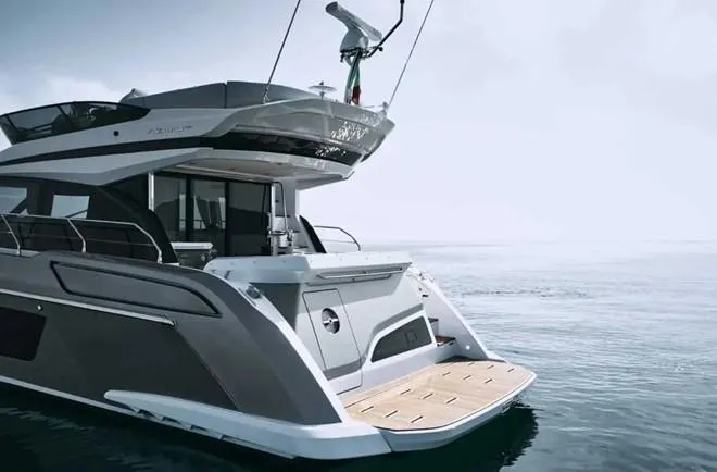 Slide: The Image of 2024 Azimut 53 Fly yacht on calm sea, showcasing sleek design and modern features. - 4