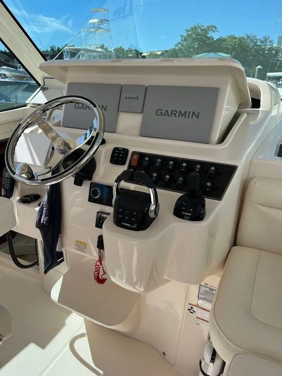 Slide: The Image of Helm of 2020 Grady-White 330 Express with Garmin electronics. - 23