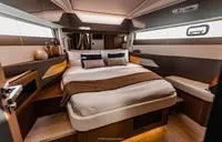 Slide: The Image of Luxurious interior of 2025 Wellcraft 44 Explorer yacht cabin with modern design. - 9