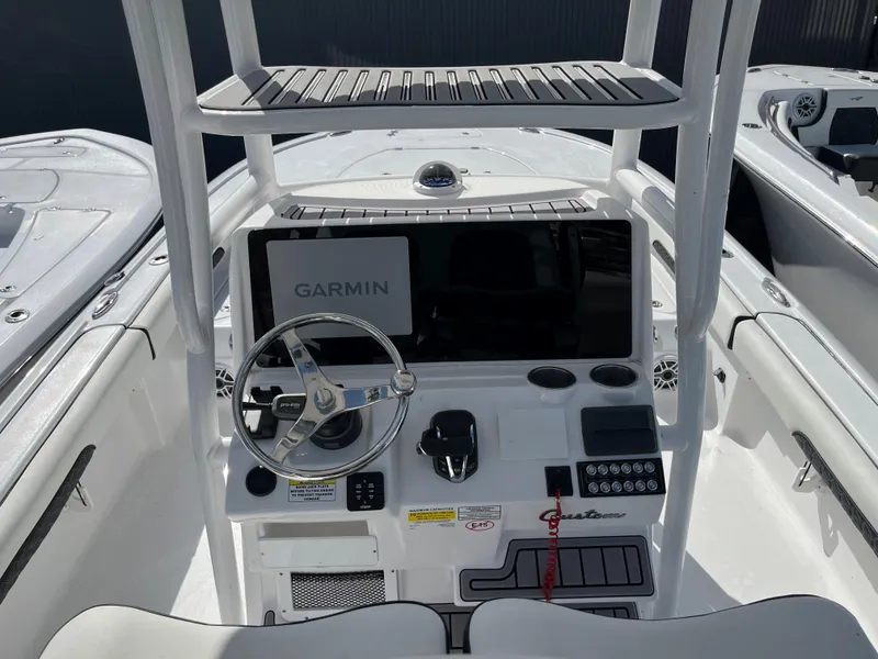 Slide: The Image of 2025 Tidewater 2500 Carolina Bay boat console with Garmin navigation system. - 10