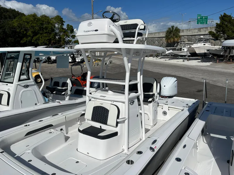Slide: The Image of 2025 Tidewater 2500 Carolina Bay boat with dual seating and elevated helm station. - 7
