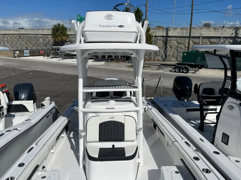 Slide: The Image of 2025 Tidewater 2500 Carolina Bay boat at a marina. - 8