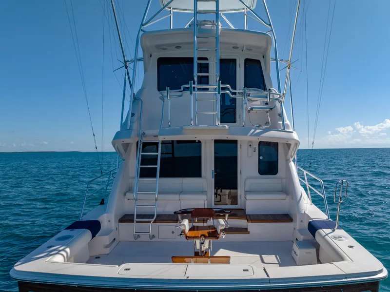 Slide: The Image of Rear view of 2009 Bertram 630 yacht on open water. - 16