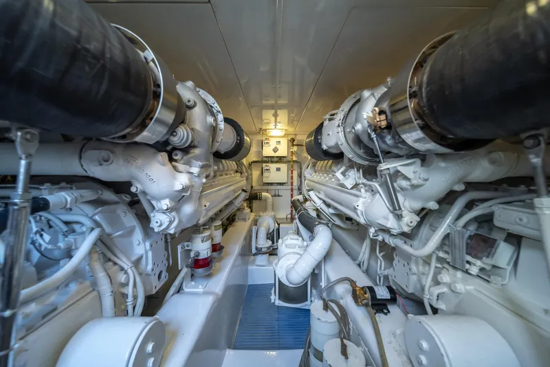 Slide: The Image of Engine room of a 2009 Bertram 630 yacht with twin engines. - 45