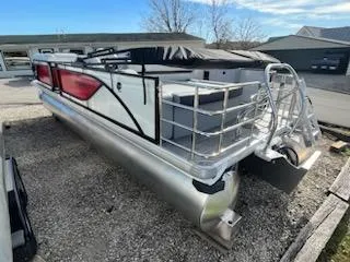 Slide: The Image of 2024 Sweetwater 2286SFL pontoon boat with sleek design and spacious deck. - 16