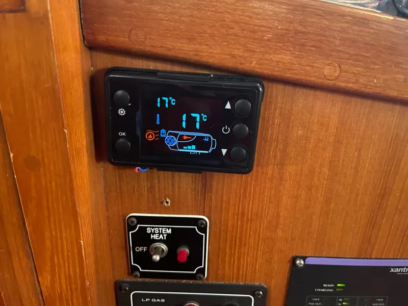 Slide: The Image of Digital control panel on a 1984 CHB 35 boat, displaying temperature settings. - 19