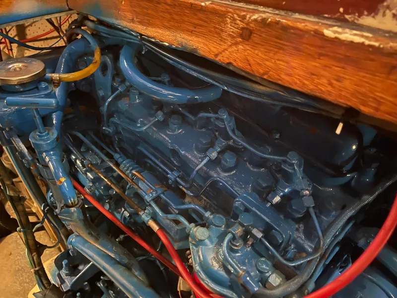 Slide: The Image of 1984 CHB 35 boat engine, blue-painted, detailed view. - 2