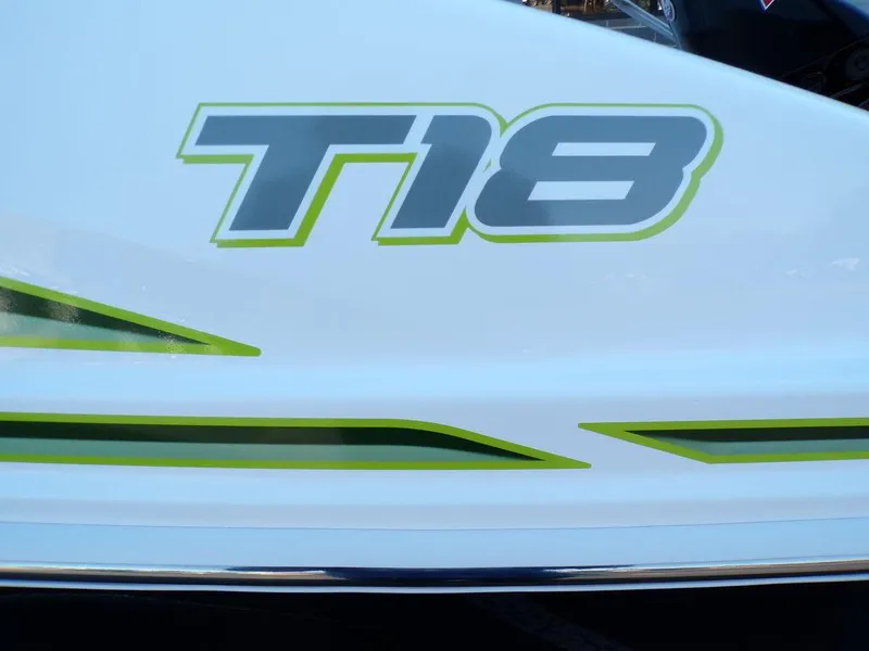 Slide: The Image of 2024 Tahoe T18 boat model with green and gray graphics. - 10