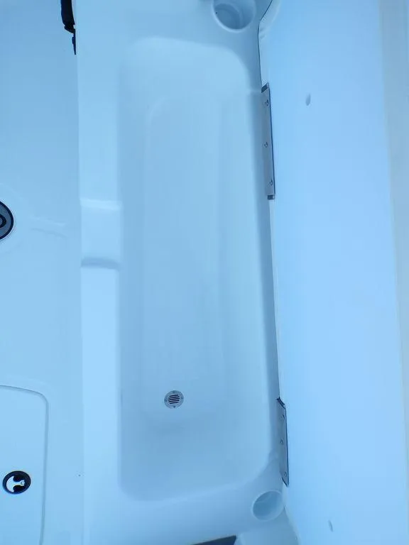 Slide: The Image of 2024 Tahoe T18 boat interior storage compartment. - 20